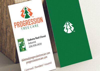 A business card created by Giant Punch. Which has a tree symbol, celebrating nature and heritage.