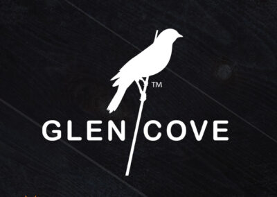 A warm and welcoming logo created by Brand Developing Company Giant Punch for Glen Cove; a business development featuring a songbird perched with a modern font.