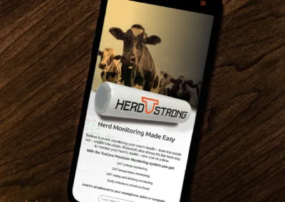Mobile phone displaying Herd Strong's innovative cattle monitoring technology.